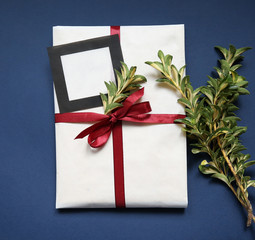 beautiful handmade gift wrapping from сraft paper and ribbons with decorations