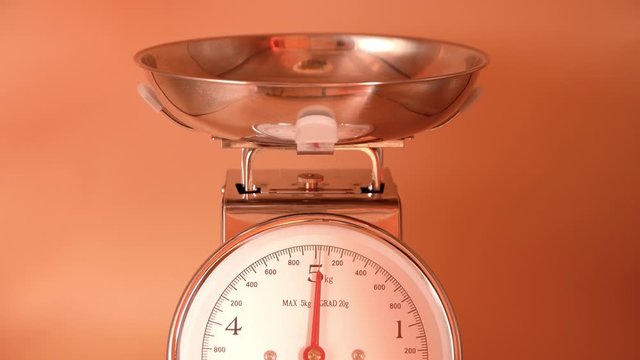 200 grams of Italian pasta on a kitchen scale. 