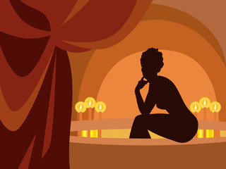 Woman sitting on the pool side with candles