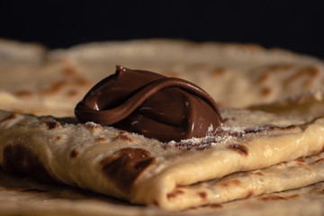 Traditional pancakes with chocolate cream