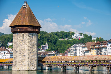 Famous Chapel Bridge, the city's symbol and one of the Switzerland's main tourist attractions on...