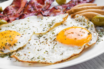 Breakfast with roasted bacon and roasted eggs