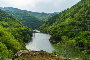 Fototapeta na wymiar Vibrant scene of Arda river in Rhodope mountains wild location for hiking in Bulgaria