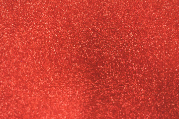 Red shiny background with sparkles. Abstract holiday background