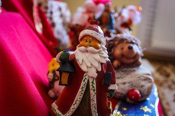Christmas Theme. Santa Claus With Candle In Hands
