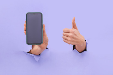 Like and smartphone. Copy space on the smartphone screen, in trendy blue