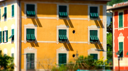 Bright and colorful Italian cityscape. Sunlit streets. Colorful houses. Warm and comfortable.