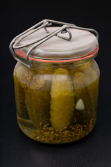 One jar of pickled cucumbers. Tasty mortars from the home garden.