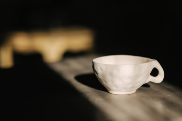 Ceramic cup for tea or coffee on the table