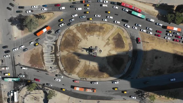Aerial  Baquedano march 2020 Plaza with  traffic on the foreground. 