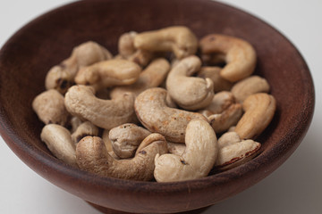 Cashew Nuts in a wooden bowl