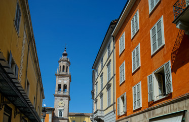Bright and colorful Italian cityscape. Sunlit streets. Colorful houses. Warm and comfortable.