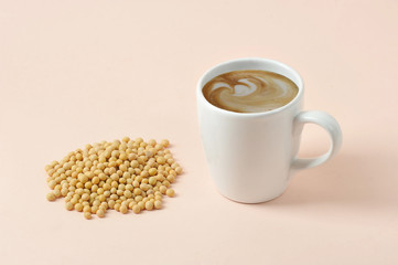 Cappuccino with soy milk milk foam. The concept of products for a healthy diet. An alternative to cow's milk. Light background Close-up. Free space for text.