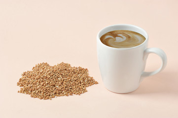 Cappuccino with buckwheat milk foam. The concept of products for a healthy diet. An alternative to cow's milk. Light background Close-up. Free space for text.