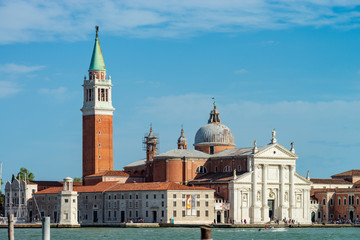 Obraz na płótnie Canvas St. Mark's Square in Venice. Tall bell tower on a sunny day.