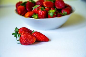 Ripe, juicy strawberries on the table