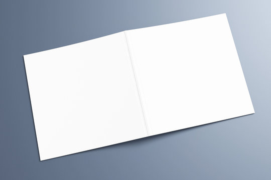 Blank opened quare catalog magazine pfoto album on grey textured background with soft shadows as template for design, portfolio presentation, promotion, etc.