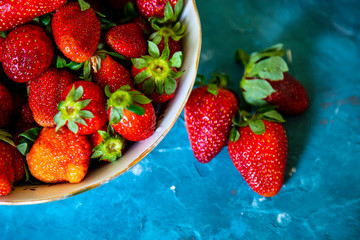 Ripe, juicy strawberries on the table