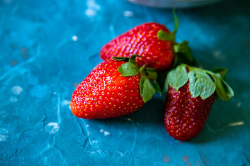 Ripe, juicy strawberries on the table