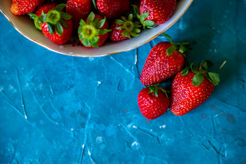 Ripe, juicy strawberries on the table