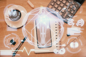 Double exposure of education theme drawing over table with phone. Top view. Science education concept.