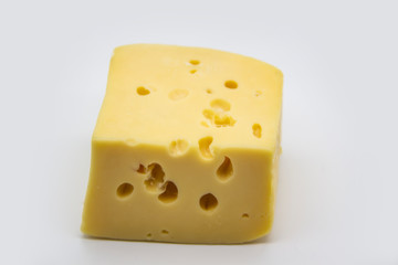 Delicious fresh hard cheese on a white background. Healty and very tasty cheese.