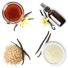 Set of vanilla extract, pudding and sugar on white background