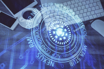 Double exposure of technology theme drawing over work table desktop. Top view. Global data analysis concept.