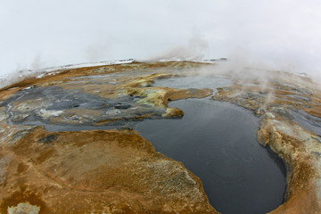 bubbling sulphuric geysers in Iceland. Powerful geothermal