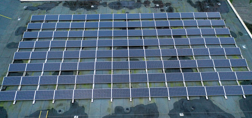Drone photo of solar panels for energy on a roof