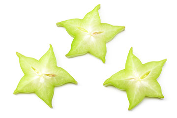 Fototapeta premium slice ripe star fruit carambola or star apple ( starfruit ) on white background. top view
