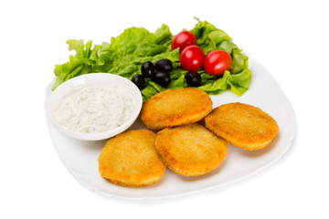 Fried fish cutlet with vegetables