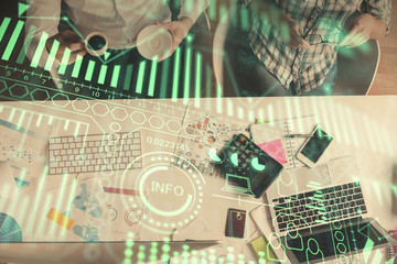 Double exposure of man and woman working together and technology theme drawing. Computer background. Top View. High tech concept.