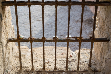 Grate and padlocks: prison or fortress?