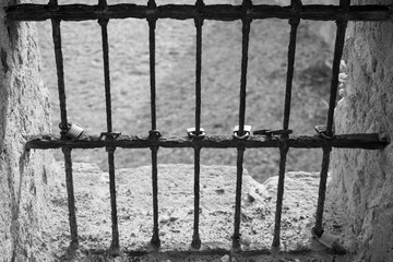 Grate and padlocks: prison or fortress?