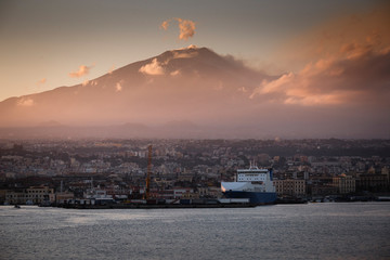 Fototapeta na wymiar Sunset over Catania city from Sicily Italy with Mount Etna in the background on a sunny day