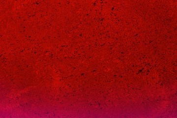 red dotted scratched plaster on the desk texture - pretty abstract photo background