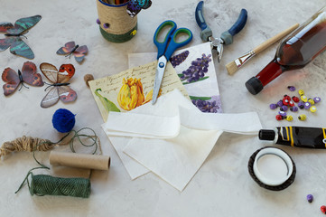 Decorating tin cans with decoupage napkins, jute rope and using various decor elements. DIY. Step by step. Step 5. Decoupage of the second Bank, preparation of napkins for gluing. Zero waste.  - obrazy, fototapety, plakaty