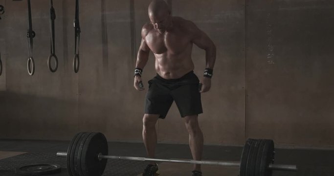 Man doing weightlifting in gym