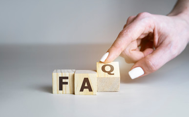 concept of FAQ word on wooden cubes