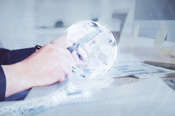 Multi exposure of man's hands holding and using a digital device and map drawing. International business concept.