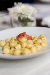small gnocchi with raw shrimp and pepper
