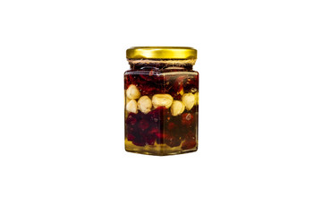 Mix of kernel And A Jar Of Golden Light Honey With A Honey Dipper