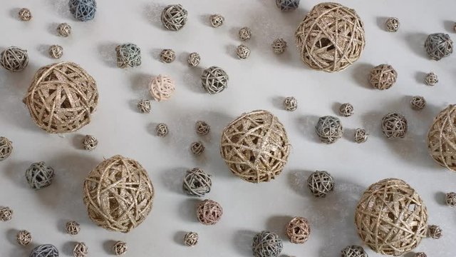 Christmas composition consisting of vine balls. 4K resolution trucking shot. Top view.