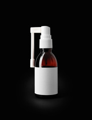 Throast spray medicine isolated on black background.