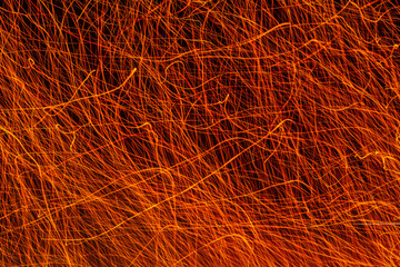 Fullscreen texture traces of sparks from a fire on a long exposure