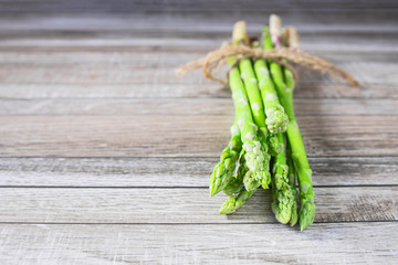 Fresh asparagus On a wooden background
