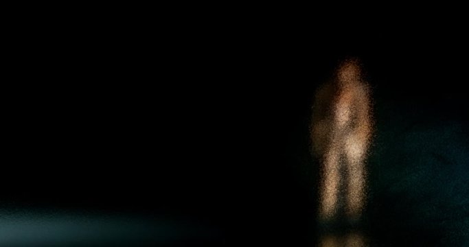 Blurry  stop motion puppet walks in  dreary circles
