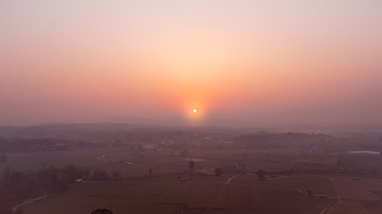 Views of views over the fields and the sun from the mountains.