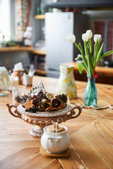 Vase on a wodden table retro kitchen vase flower cookie orange